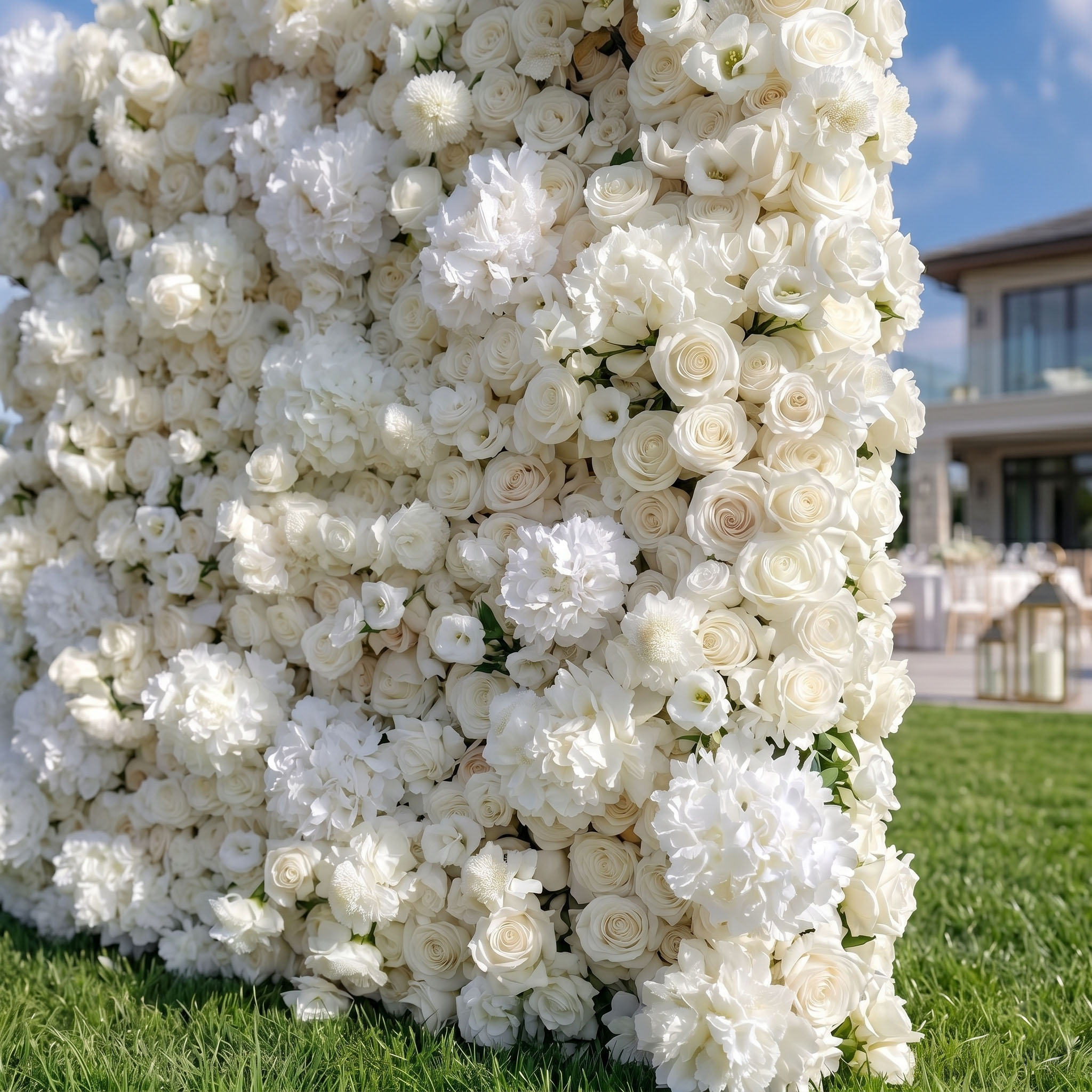 Close-up of all white flower wall with Real Touch roses, peonies and lisianthus